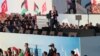 رجب طیب اردوغان، رییس جمهور ترکیه، هنگام سخنرانی در میان صدها هزار حامی فلسطینی‌ها در شهر استانبول