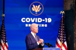 FILE - President-elect Joe Biden speaks at The Queen theater, in Wilmington, Del., Dec. 29, 2020.