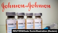 FILE PHOTO: Vials with a sticker reading, "COVID-19 / Coronavirus vaccine / Injection only"