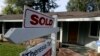 FILE - A home across the street from the Apple campus is advertised as sold in Sunnyvale, Calif. Sales of new homes, an indicator of a healthy economy, have risen in the U.S. in 2018 since the housing crisis of the late 2000s.