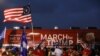 People take part in an event to show their support for U.S. President Donald Trump in Macomb County, Michigan, December 8, 2020.