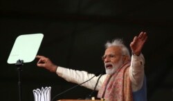 Indian Prime Minister Narendra Modi addresses a rally of his Hindu nationalist Bharatiya Janata Party in New Delhi, Dec. 22, 2019.