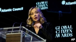 Giorgia Meloni, Italy's president of the Council of Ministers, gives an acceptance speech during the Global Citizen Awards dinner, Sept. 23, 2024, in New York.