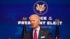 FILE - President-elect Joe Biden speaks as Vice President-elect Kamala Harris, left, listens during an event to introduce their future administration's nominees and appointees, at The Queen theater in Wilmington, Delaware, Dec. 1, 2020. 